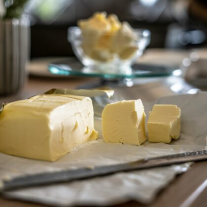 Why does butter contain so little lactose?